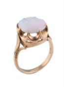 An opal single stone ring