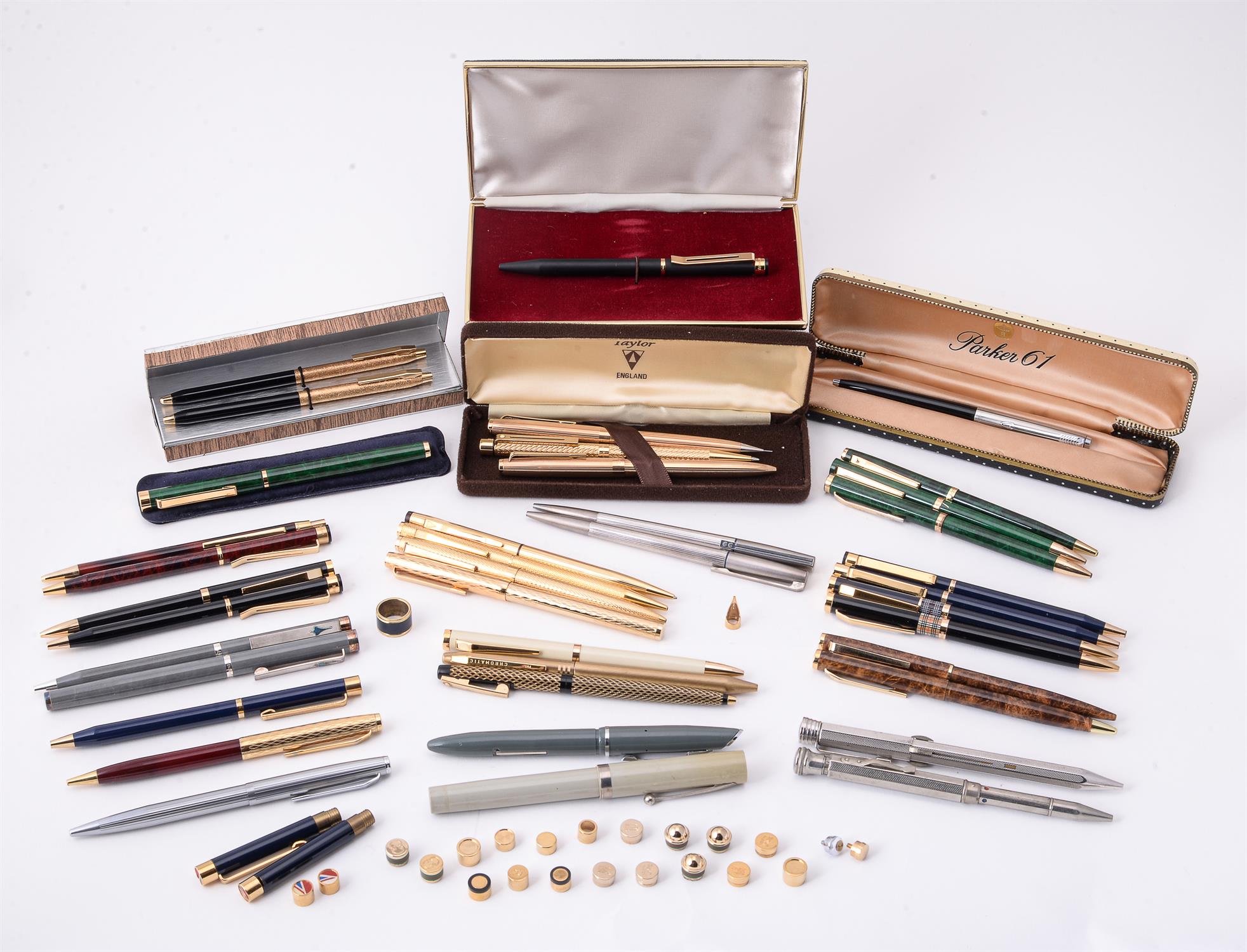 A collection of ball point pens, roller ball pens and propelling pencils