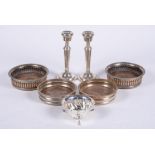 A pair of silver candlesticks by A. T. Cannon Ltd.