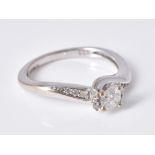 A diamond single stone ring