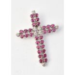 A ruby and diamond cross