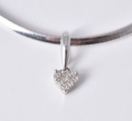 A heart shaped diamond pendant