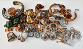 A group of silver coloured and costume jewellery