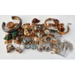 A group of silver coloured and costume jewellery