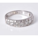 A diamond half eternity ring