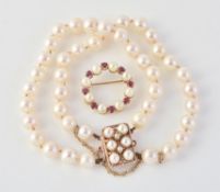 A cultured pearl and ruby circlet brooch