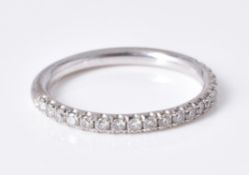 A diamond half eternity ring