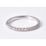 A diamond half eternity ring