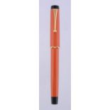 Parker, Duofold, an orange ball point pen