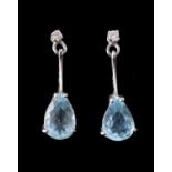 A pair of aquamarine and diamond earrings