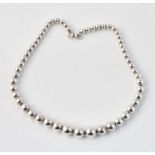 A silver bead link collar necklace by Tiffany & Co.