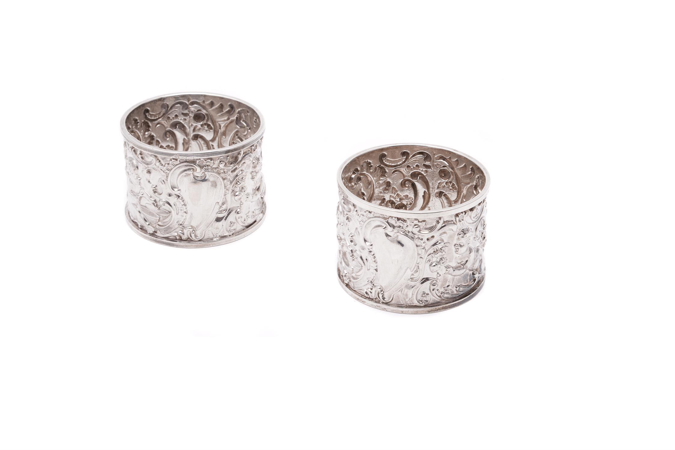 A pair of late Victorian silver napkin rings by William Richard Corke