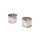 A pair of late Victorian silver napkin rings by William Richard Corke