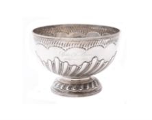An Edwardian silver circular pedestal punch bowl