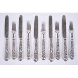 Five pairs of Victorian silver Chased Vine pattern dessert knives and forks by Aaron Hadfield