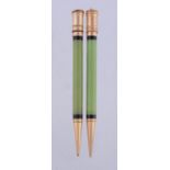 Parker, two green and gold filled propelling pencils