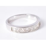 A diamond half eternity ring