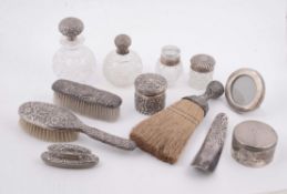 A collection of assorted silver and silver coloured mounted dressing table items