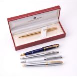 A collection of ball point pens