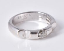A diamond single stone band ring