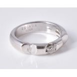 A diamond single stone band ring