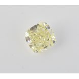 † An un-mounted fancy light yellow coloured diamond