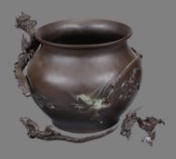 A Japanese Bronze Vase or Jardiniere of bulbous form with broad mouth