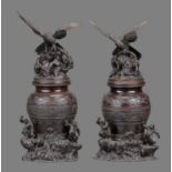 A Near Pair of large Japanese Bronze Vases and Covers
