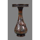 A Japanese Bronze Vase of inverted baluster form rising to a tapering