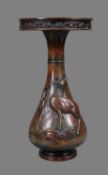 A Japanese Bronze Vase of inverted baluster form rising to a tapering