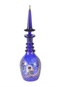 A Bohemian large blue-stained glass decanter and stopper