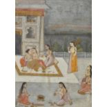 A lady on a terrace with her companions