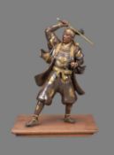 GYOKKO: A Japanese Parcel Gilt Bronze Figure of a Samurai Warrior