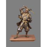 GYOKKO: A Japanese Parcel Gilt Bronze Figure of a Samurai Warrior