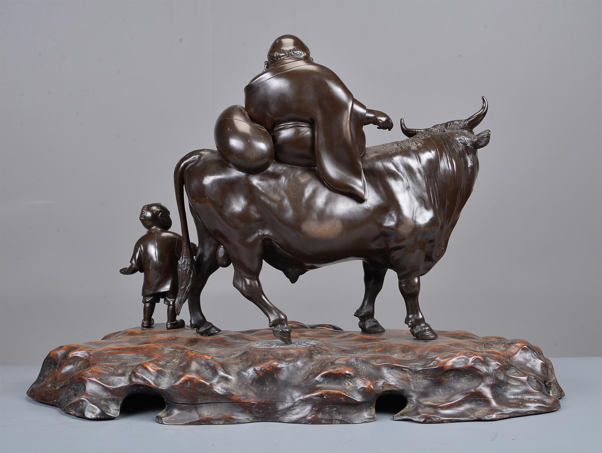 A Large Japanese Bronze Group of Hotei seated on the back of an ox - Image 4 of 4