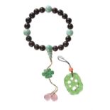 A Chinese wood and jadeite rosary bracelet