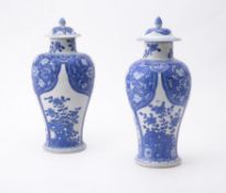 Two similar Chinese 'Shipwreck' blue and white vases and covers