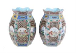 A pair of large famille rose 'mille-fleurs' lanterns