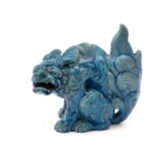 A Chinese turquoise- glazed 'lion dog'
