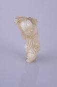 A Chinese celadon jade figure of Shoulao