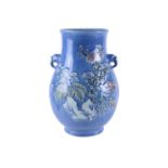 A large Chinese blue-glazed twin-handled vase