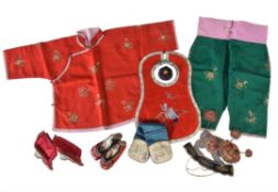 A group of Chinese child's clothes and shoes