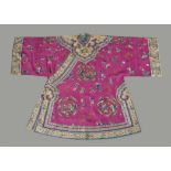 An attractive Chinese magenta silk damask Han Chinese women's robe