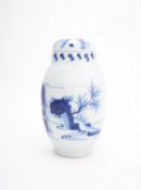 A Chinese blue and white transitional-style ovoid vase and cover