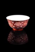 A Chinese coral-ground reserve decorated 'Lotus' bowl