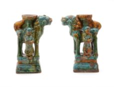 A pair of Chinese pottery Sancai glazed joss stick holders