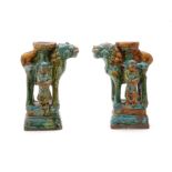 A pair of Chinese pottery Sancai glazed joss stick holders