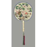 Y A fine Chinese double sided embroidered fan from the Suzhou embroidery region