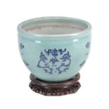 A Chinese blue and white celadon-ground jardinière