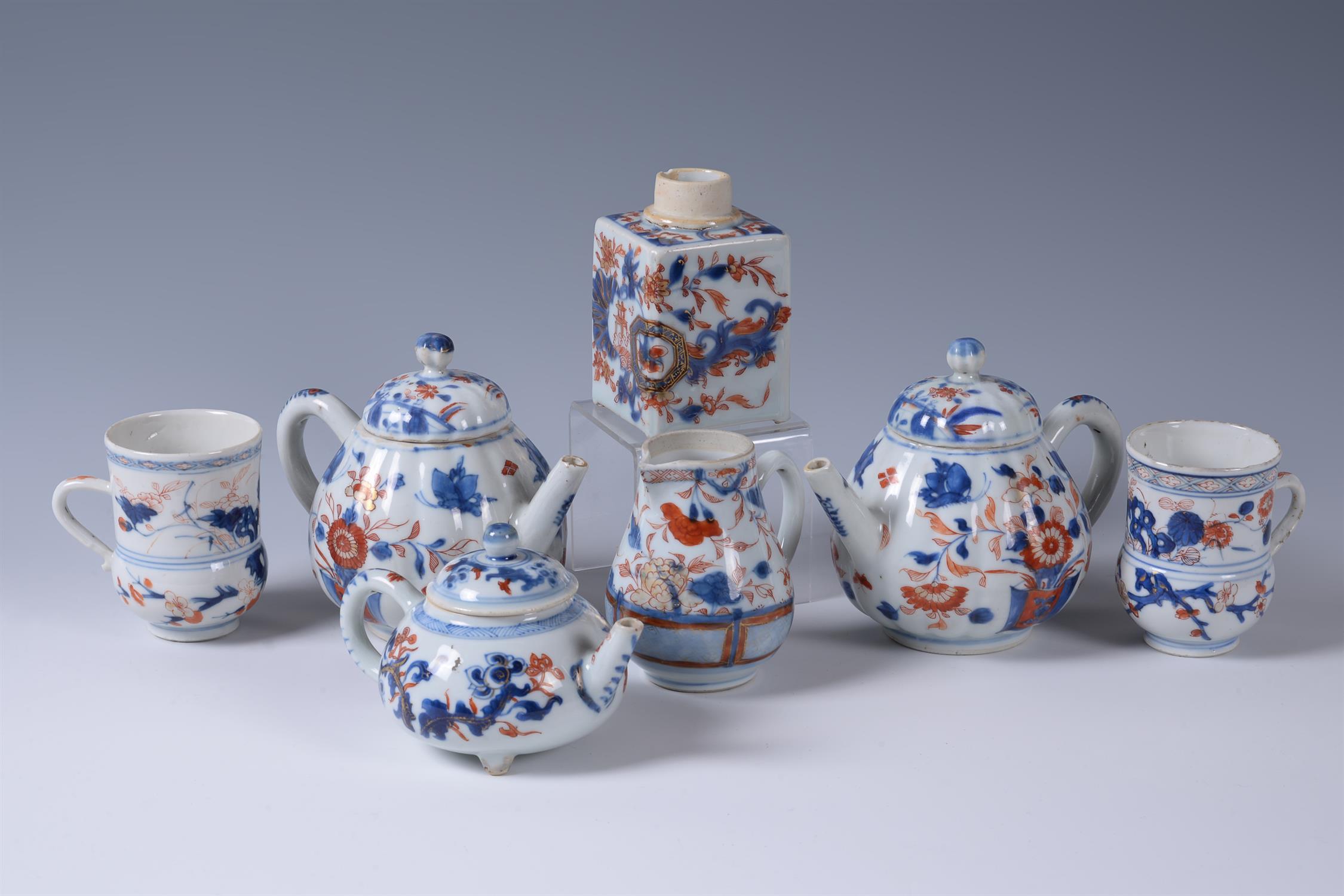 Three Chinese Imari teapots and covers